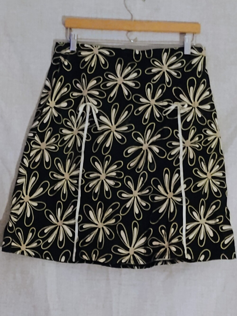 Black Floral A-Line Slightly Above Knee Skirt with White And Yellow Floral Print